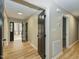 Bright foyer with hardwood floors, contrasting trim, and convenient access to multiple rooms at 314 Mill Creek Dr, Fuquay Varina, NC 27526