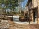 Spacious backyard with a large in-ground pool, brick house, and privacy fence at 3217 Stoneyford Ct, Raleigh, NC 27603