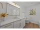 Bright bathroom with a vanity, quartz countertop, and gold fixtures at 3217 Stoneyford Ct, Raleigh, NC 27603