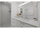 Elegant bathroom featuring a white vanity with stone countertops and modern fixtures at 3217 Stoneyford Ct, Raleigh, NC 27603