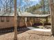 Charming brick home features a welcoming entrance with freshly mulched garden beds at 3217 Stoneyford Ct, Raleigh, NC 27603