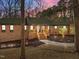Inviting brick home featuring a charming entryway and freshly mulched garden beds at 3217 Stoneyford Ct, Raleigh, NC 27603