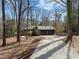 Brick home with an attached two-car garage and large driveway at 3217 Stoneyford Ct, Raleigh, NC 27603
