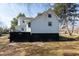 An outdoor basement access of a well maintained two-story Gathering home at 347 W Trade St, Burlington, NC 27217