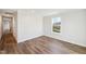 Bedroom with neutral walls and hard wood floors and a window providing natural light at 349 Tristen Ln, Henderson, NC 27537