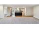 Open-concept kitchen featuring an island, stainless steel appliances, and modern finishes at 349 Tristen Ln, Henderson, NC 27537