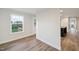 A sunlit living area with hardwood floors and view of the yard at 349 Tristen Ln, Henderson, NC 27537