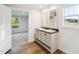 Ensuite bathroom features double sinks and bright natural light at 349 Tristen Ln, Henderson, NC 27537