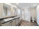 A main bathroom boasts double sinks and a glass-enclosed shower at 349 Tristen Ln, Henderson, NC 27537