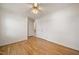 This bedroom features hardwood floors, a ceiling fan and a closet at 3529 Elk St, Burlington, NC 27215