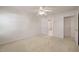 Spacious bedroom featuring neutral walls, carpet floors, and a ceiling fan at 3529 Elk St, Burlington, NC 27215