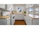 Functional kitchen featuring white appliances, ample counter space, and good lighting at 3529 Elk St, Burlington, NC 27215