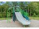 Community playground with a slide, climbing structures, and soft ground covering at 359 Church St # 60, Wendell, NC 27591