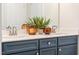 Bathroom vanity with double sinks, quartz countertop, and decorative plant at 361 Church St # 59, Wendell, NC 27591