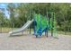 Community playground with slide, climbing structures, and safety surfacing at 361 Church St # 59, Wendell, NC 27591