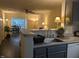 Open floor plan kitchen with views into the dining and living areas, perfect for entertaining at 3710 Pardue Woods Pl # 103, Raleigh, NC 27606