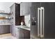 Modern kitchen features dark cabinets, stainless steel appliances, and light countertops at 4300 Camelot Dr, Raleigh, NC 27609