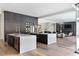 Spacious kitchen with dark cabinets, white countertops, and two islands at 4300 Camelot Dr, Raleigh, NC 27609