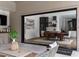Covered patio with large sliding glass doors opening into the dining room at 4300 Camelot Dr, Raleigh, NC 27609