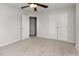 Bedroom features a ceiling fan, closet and neutral colored walls and carpet at 4308 Brynwood Ave, Durham, NC 27713