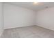 Empty bedroom with neutral carpet and paint and overhead light at 4308 Brynwood Ave, Durham, NC 27713
