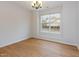 Traditional dining room featuring wood floors and a window with natural light at 4308 Brynwood Ave, Durham, NC 27713
