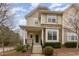 Charming two-story townhouse with stone accents and a welcoming front porch at 4308 Brynwood Ave, Durham, NC 27713