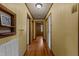 Hallway with hardwood floors and neutral walls, connecting to other rooms in the home at 4316 Old Faison Rd, Knightdale, NC 27545