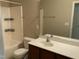 Bathroom featuring combined shower and tub with single sink vanity and toilet at 4469 Middletown Dr, Wake Forest, NC 27587