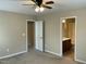 Bedroom features carpet, a ceiling fan, and an ensuite bathroom with a shower at 4469 Middletown Dr, Wake Forest, NC 27587