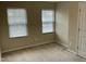 Cozy bedroom featuring natural light from two windows and neutral walls at 4469 Middletown Dr, Wake Forest, NC 27587