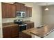 Modern kitchen featuring stainless steel appliances and laminate countertops at 4469 Middletown Dr, Wake Forest, NC 27587