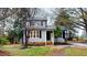 Charming two-story home with well-manicured lawn and mature trees creating curb appeal at 4604 Sweet Melody Ln, Knightdale, NC 27545