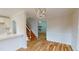 Open living room with staircase, view into dining room, and fireplace at 4604 Sweet Melody Ln, Knightdale, NC 27545