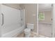 Bathroom with tub and shower, and tile flooring at 502 Forest Court, Carrboro, NC 27510