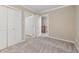 Carpeted bedroom with closet at 502 Forest Court, Carrboro, NC 27510