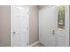 The entryway shows white doors and a glimpse of the outside through the window at 502 Forest Court, Carrboro, NC 27510