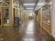 Carr Mill Market interior hallway view with wooden frames and storefronts at 502 Forest Court, Carrboro, NC 27510