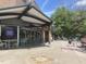 Exterior view of Weaver Street Market and Cafe with outdoor seating and colorful chairs at 502 Forest Court, Carrboro, NC 27510