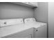 Laundry room featuring white washer and dryer at 543 Pine Ridge Place, Raleigh, NC 27609