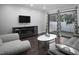 Comfortable living room with modern decor and a sliding door to the patio at 543 Pine Ridge Place, Raleigh, NC 27609