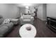 Open-concept living room connecting to the kitchen and dining areas at 543 Pine Ridge Place, Raleigh, NC 27609