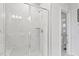 Modern glass enclosed shower featuring elegant tile, and a shower head at 600 Hedrick Ridge Road # 104, Cary, NC 27519
