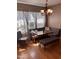 Cozy dining area featuring built-in seating, a rustic table, and a decorative chandelier at 601 Aiken Pkwy, Fuquay Varina, NC 27526