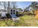 Large backyard with shed and gardens offering an outdoor storage solution and a serene outdoor living space at 604 Chadbourne Dr, Durham, NC 27703