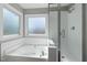 Bright and spacious bathroom with large tub and shower at 604 Chadbourne Dr, Durham, NC 27703