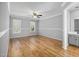Spacious bedroom with neutral walls and hardwood floors at 604 Chadbourne Dr, Durham, NC 27703