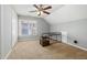 Bedroom features carpet, ceiling fan, and desk area at 604 Chadbourne Dr, Durham, NC 27703