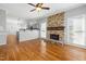 Open concept living room and kitchen with lots of natural light and hardwood floors at 604 Chadbourne Dr, Durham, NC 27703