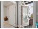 Bathroom doorway with shower and view to the relaxing balcony at 605 Smedes Pl # B, Raleigh, NC 27605
